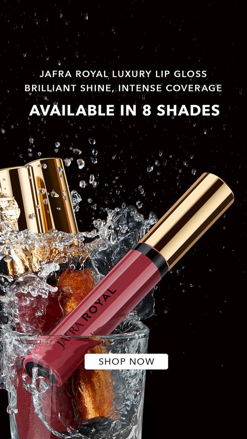 Jafra Royal Luxury Lip Gloss with a water splash against black