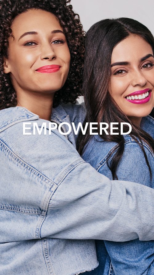 Two women embracing, 'Empowered' campaign card